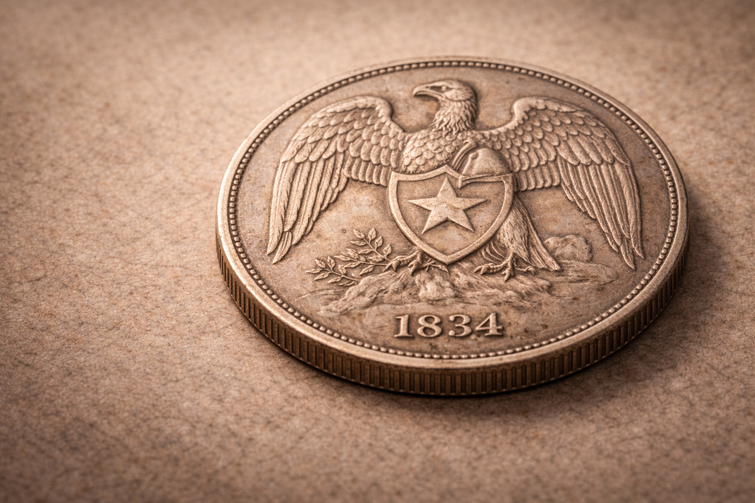 Close view of the 1834 Chile peso coin showing the condor emblem and early republican design details.