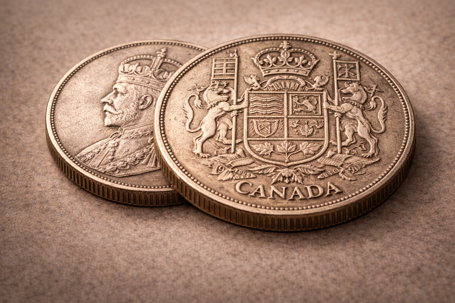 Close view of the 1921 Canadian fifty cents silver coin showing detailed engravings and aged silver surface.