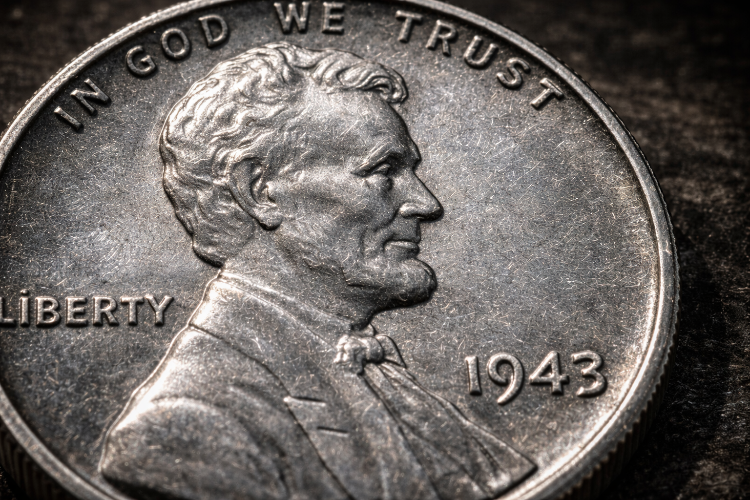 Close up of 1943 steel penny surface showing zinc coating texture