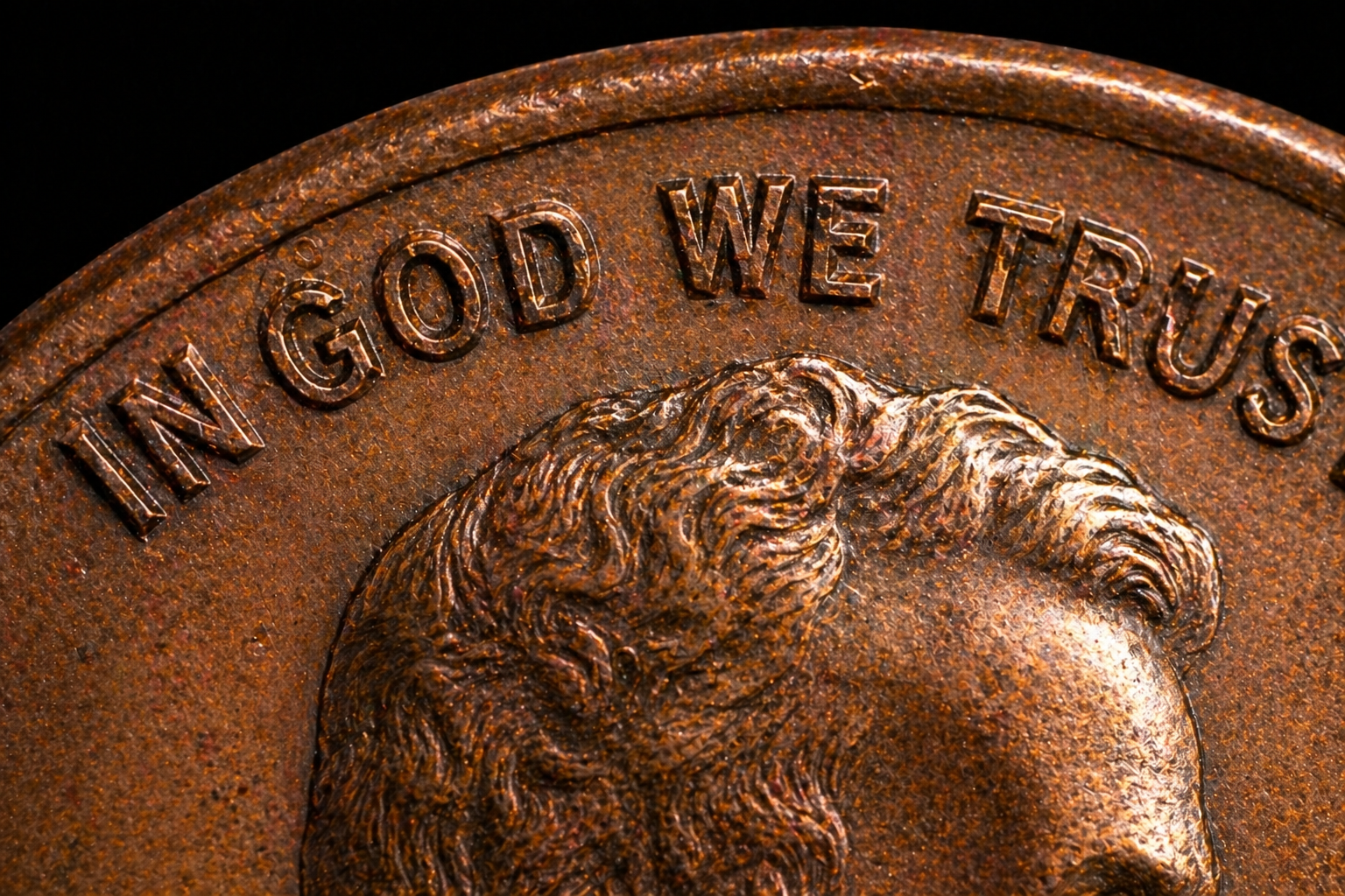 Close up of coin showing doubled die error with duplicated lettering