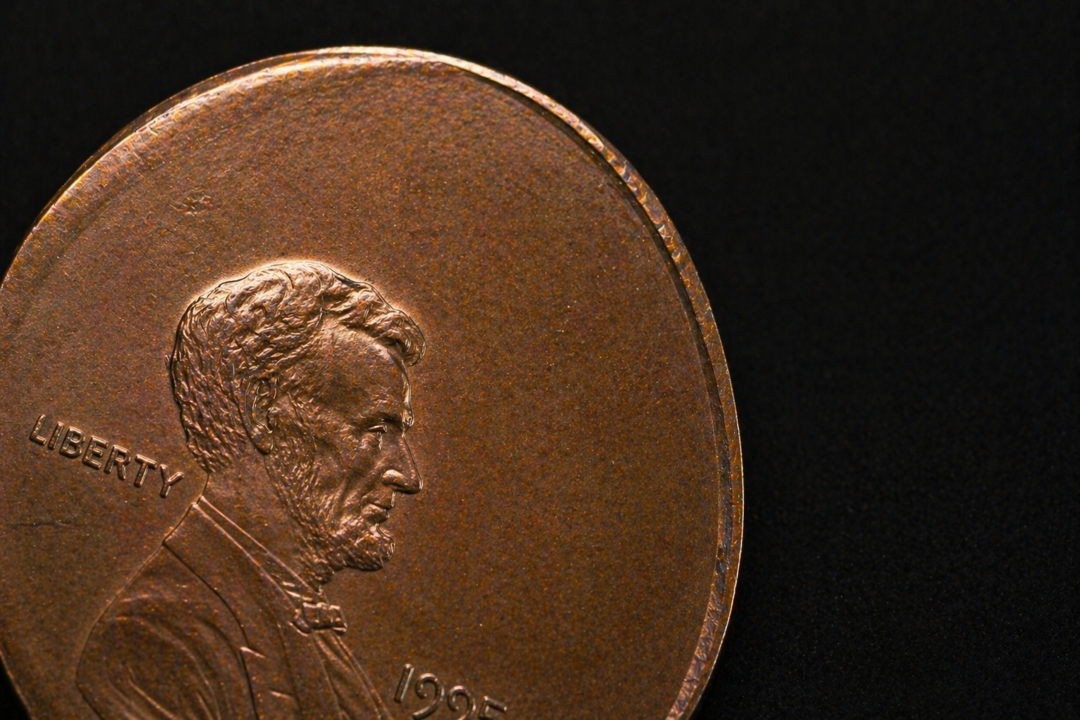 Coin showing off center strike with misaligned design