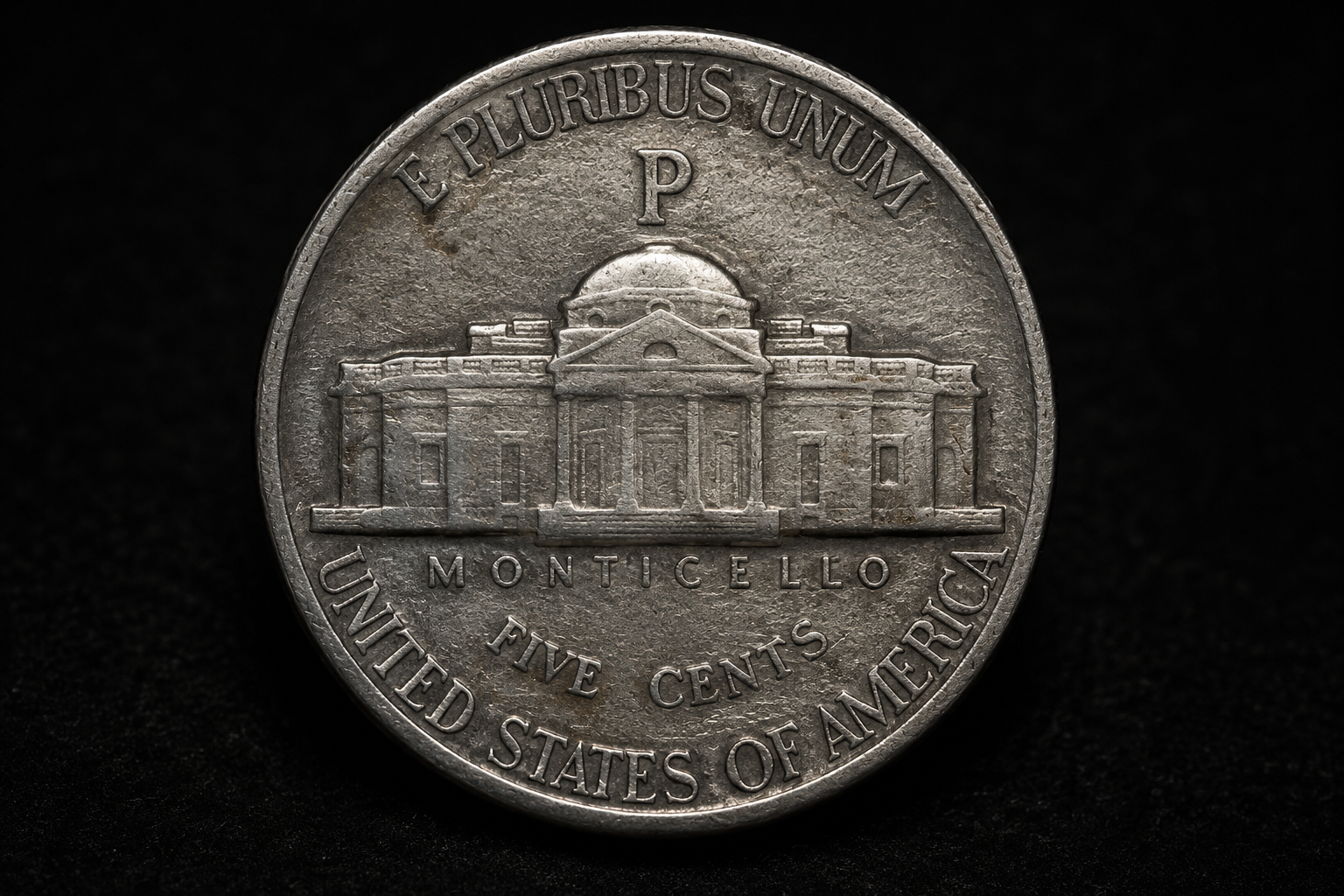 Large mint mark on a wartime Jefferson nickel above Monticello